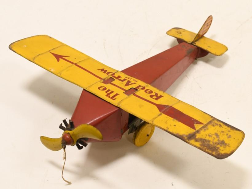 Henry Katz & Co The Red Arrow Monoplane: Nice original Henry Katz & Co. "The Red Arrow Monoplane airplane toy. Manufactured by the Henry Katz & Company. Displays nicely with some paint loss and wear from age. Wingspan measures approximately 