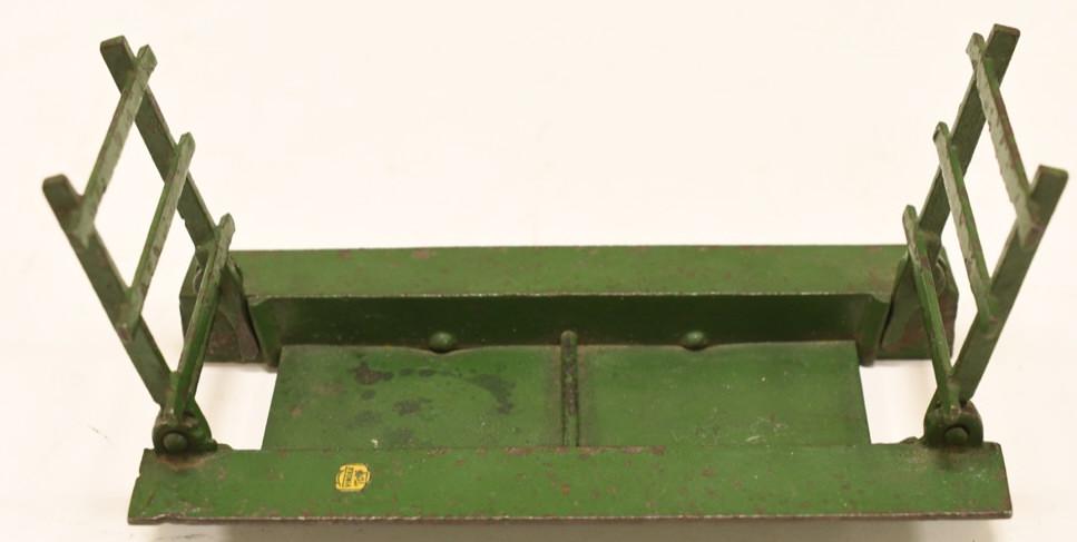 Early Cast Iron Vindex John Deere Hay Rack: Nice early cast iron Vindex John Deere Hay Rack. No running gear. Displays nicely with wear from play and age. Has the Vindex Toys decal. Measures approximately 8" long