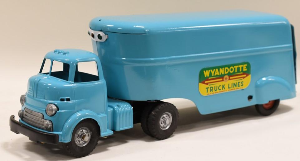 Restored Wyandotte Truck Lines Truck and Trailer: Nice restored Wyandotte truck lines truck and trailer. Tires have cracking. Displays nicely with wear from display and age. Measurse approximately 23" long.
