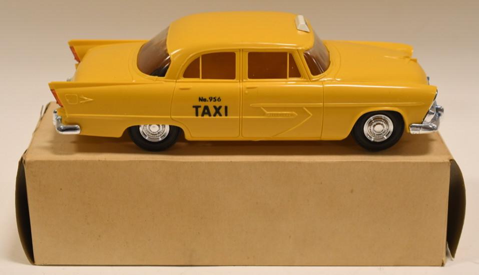 1956 Plymouth Belvedere 4 Door Taxi Promo Car: Nice 1956 Plymouth Belvedere 4 door taxi promo car with box. By Jo-Han models. Grill has some blue paint. Displays nicely with wear from play and age. Measures approximately 8" long.