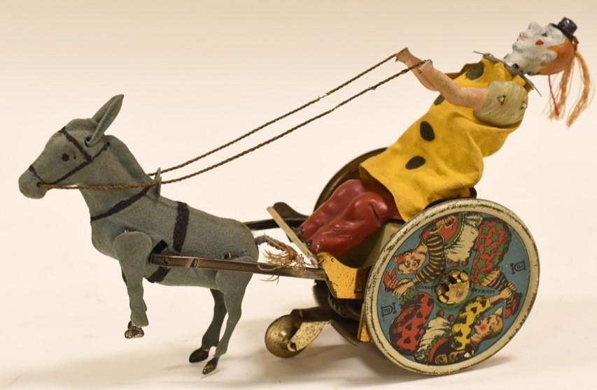 German Lehmann Stubborn Donkey Tin Toy: Nice German Lehmann Stubborn Donkey tin toy. Displays nicely with paint loss and wear from age and play. Windup needs work. Measures approximately 7 1/2" long.
