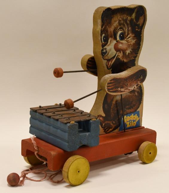 Vintage Fisher Price Teddy Zilo Pull Toy: Nice vintage Fisher Price Teddy Zilo wood pull toy. Made of wood. Displays nicely with wear from play and age. Nice working condition. Measures approximately 10 1/2" tall.