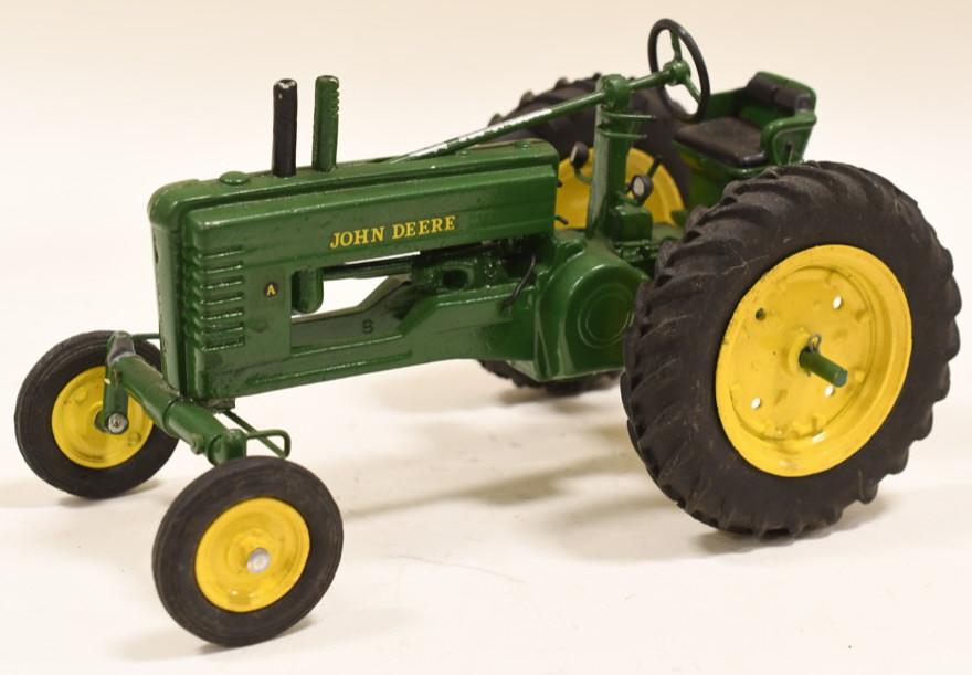 Vintage Custom 1/16 John Deere Model A High Post: Nice 1/16 scale Ertl John Deere Model A high post. This started out as an original Ertl John Deere model B high post. Nice older custom toy. Displays nicely with light waer from display and age.