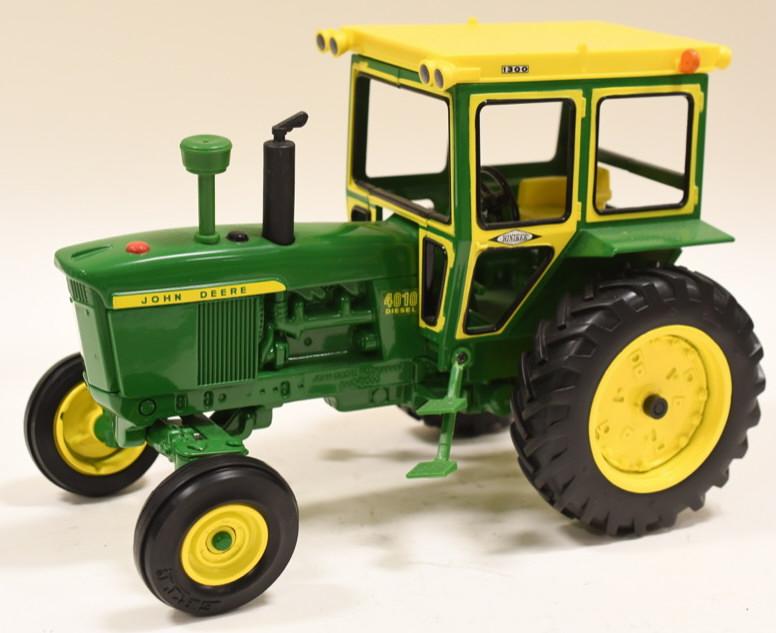 1/16 Ertl John Deere 4010 Diesel with Hiniker Cab: Nice 1/16 scale Ertl John Deere 4010 diesel with Hiniker Cab. Displays nicely with light wear from age and display.