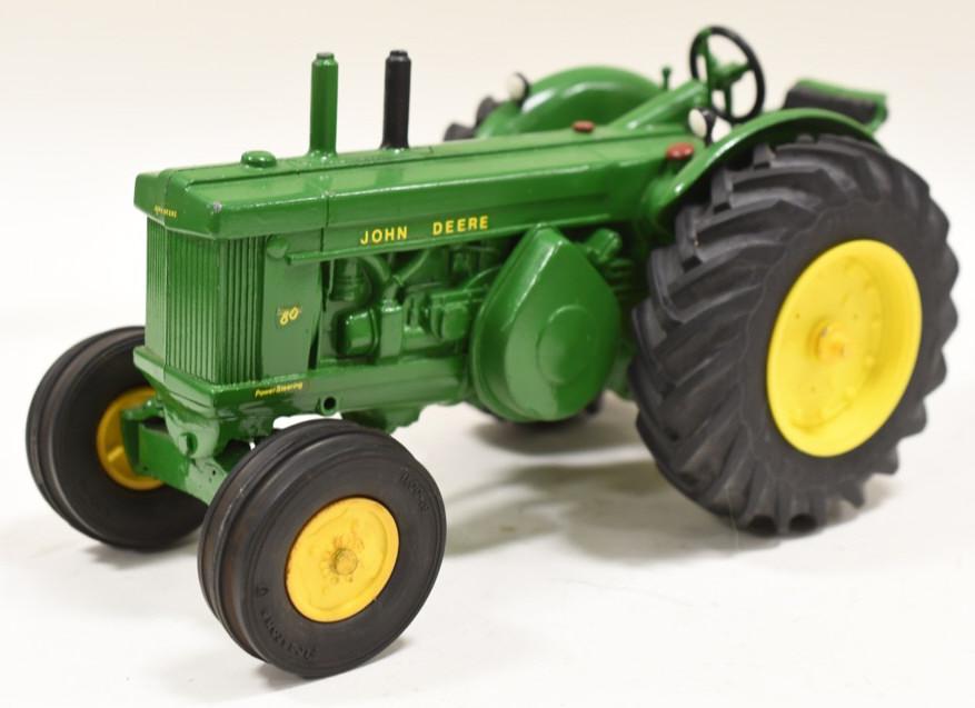 Custom 1/16 Ertl John Deere Model 80: Nice custom 1/16 scale John Deere model 80 tractor. Displays very nicely. Nice custom with levers, lights, and new tires. Displays nicely with wear from display and age.