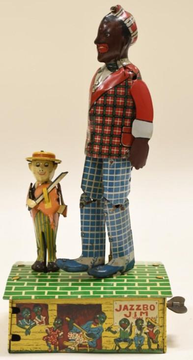 Tin Litho Windup Linemar Marx Jazzbo Jim: Nice tin litho windup Linemar Marx Jazzbo Jim. Displays nicely with wear from age and play. Windup works. Nice condition for age. Measures approximately 8 1/2" tall.