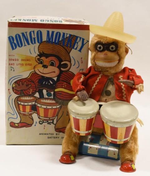 Alps Battery Op. Bongo Monkey: Nice Alps Japan battery operated Bongo Monkey with reproduction box. Displays nicely with wear from play and age. Measures approximately 9" tall.