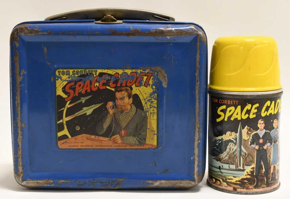 1952 Aladdin Tom Corbett Space Cadet Lunch Box: Nice 1952 Aladdin Tom Corbett Space Cadet metal lunch box with thermos. Lunch box has paint loss and wear from use and age. Displays nicely. Measures approximately 8" across.