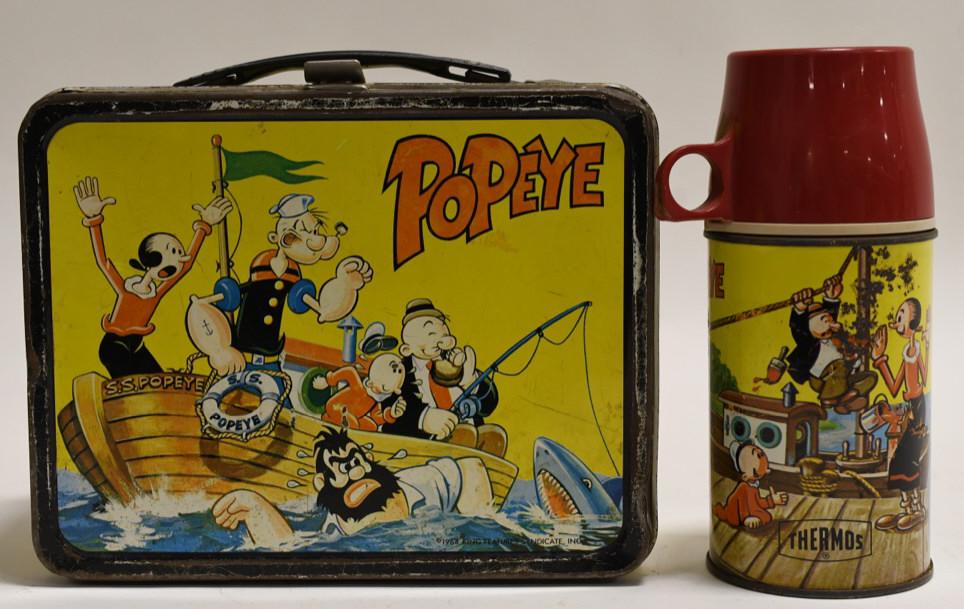 1964 Thermos Popeye Metal Lunch Box: Nice 1964 Thermos Popeye metal lunch box and thermos. Lunch box has paint loss and wear from use and age. Displays nicely. Has some rust. Measures approximately 8 3/4" across.