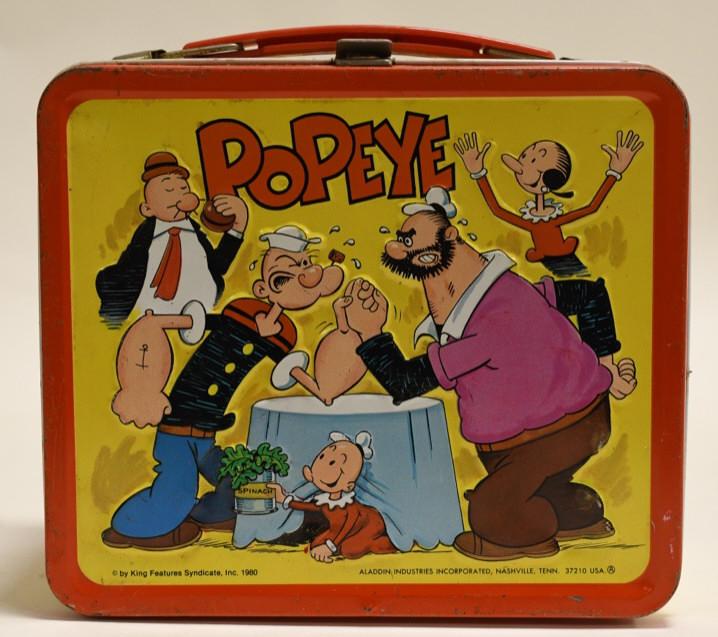 1980 Aladdin Popeye Metal Lunch Box: Nice 1980 Aladdin Industries Popeye metal lunch box. Lunch box has paint loss and wear from use and age. Displays nicely. Measures approximately 8" across.