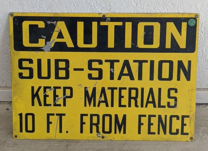 One sided metal caution sign (1 of 2)
