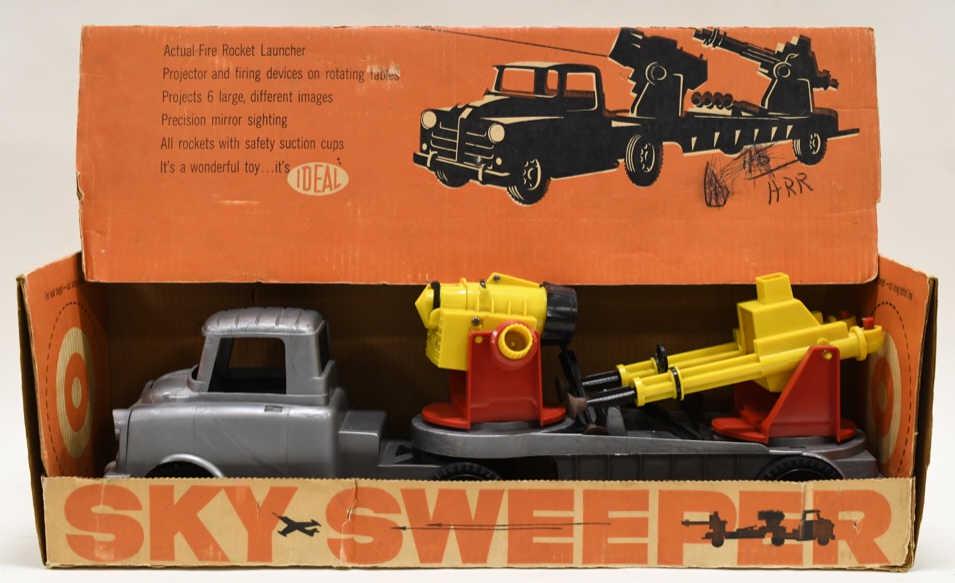 Ideal Sky Sweeper Air Defense Rocket Launcher: Truck. Nice Ideal Sky Sweeper air defense rocket launcher truck in the box. Nice condition with some wear from play and age. Box has some writing and wear and tear. Displays nicely. Measures approxima