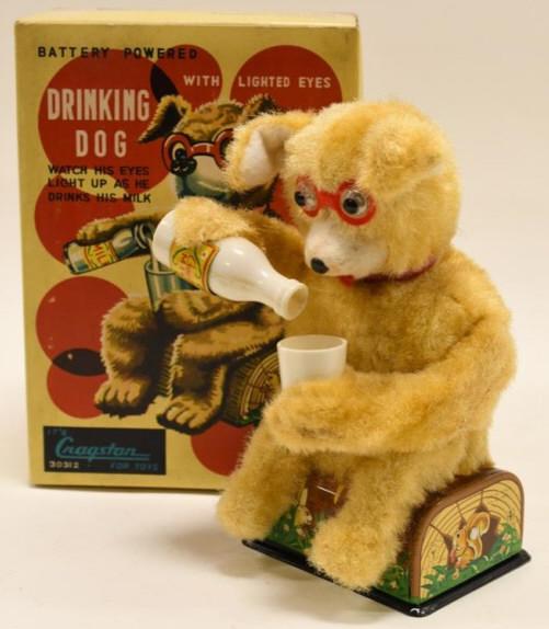 Cragstan Battery Op. Drinking Dog: Nice Cragstan battery operated drinking dog with box. Displays nicely with wear from age and play. Toy is untested. Measures approximately 8 1/2" tall.
