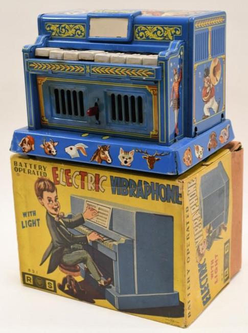 Rosko Steele Inc. Battery Op. Electric Vibraphone: Nice Rosko Steele Inc. battery operated Electric Vibraphone in box. Displays nicely with paint loss and wear from play and age. Measures approximately 7 1/2" long.