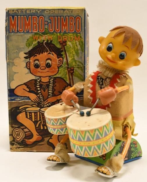 Alps Battery Op. Mumbo-Jumbo w/ Drum: Nice Alps battery operated Mummbo-Jumbo with box. Box has some repairs. Displays nicely with wear from play and age. Nice condition. Measures approximately 10 1/2" tall.