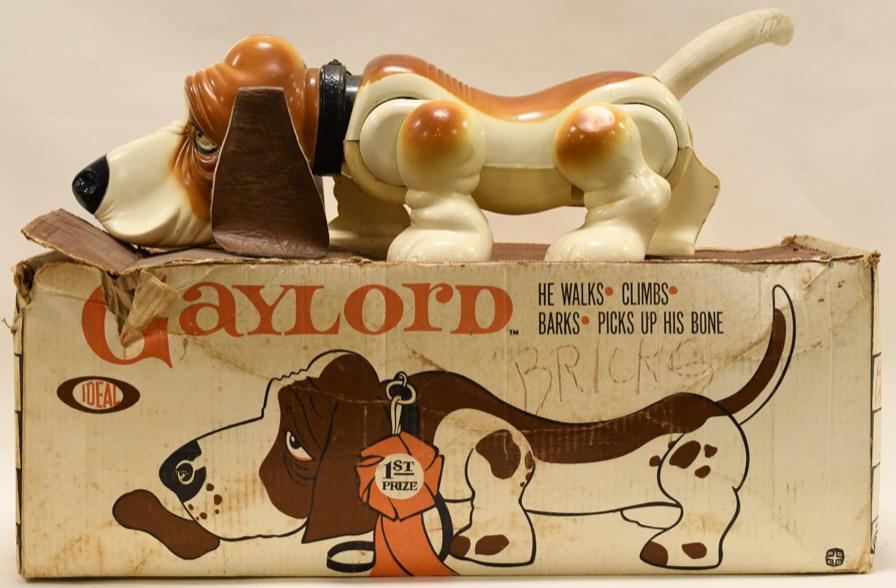 1962 Ideal Gaylord The Basset Hound: Nice vintage Ideal Gaylord The Basset Hound with box. Box has wear and tear from age. Toy has paint loss and wear from play and age. Gaylord is missing his bone. Battery compartment lid has been repla