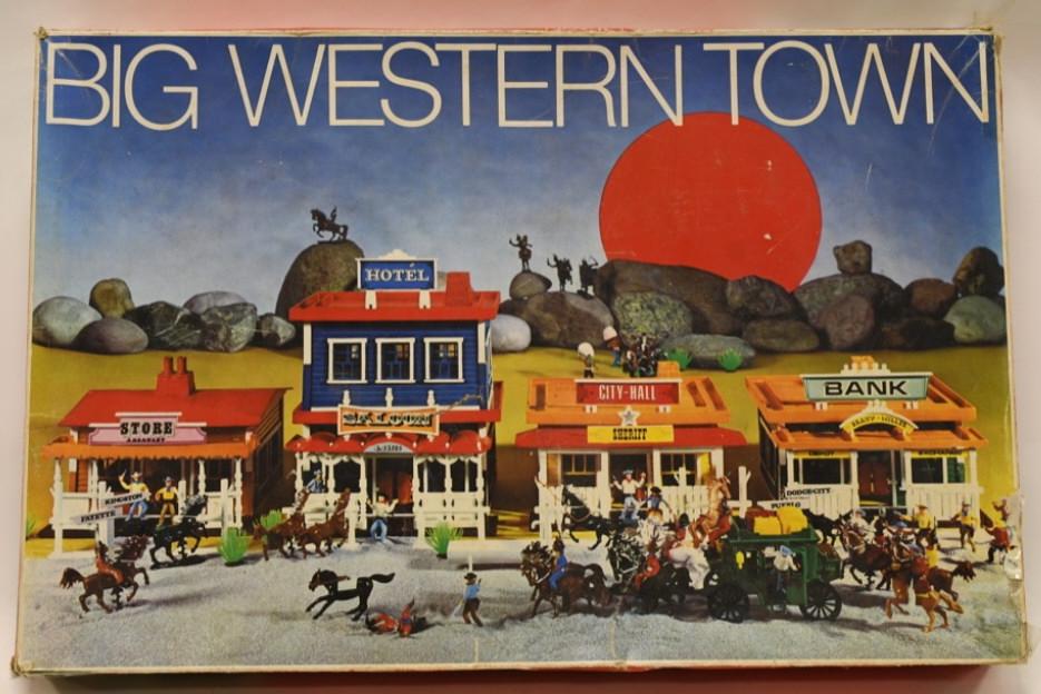 Sears Big Western Town Playset: Nice vintage Sears Big Western Town playset made in Western Germany. Unsures if set is complete. Displays nicely with wear from play and age. Box measures approximately 24" long by 16" wide.