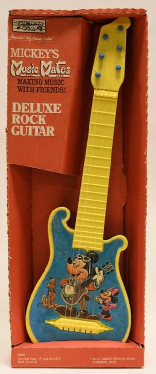 Carnival Toys Mickey's Music Mates Deluxe Guitar: Nice Carnival Toys Mickey's Music Mates Deluxe Rock Guitar with box. Displays very nicely with some light wear from age. Measures approximately 21 1/2" tall.