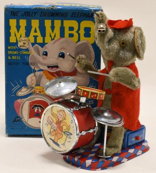 Alps Battery Op. Mambo The Jolly Drumming Elephant: Nice Alps Japan battery operated Mambo the Jolly Drumming Elephant with box. Displays nicely with wear from age and play. Untested. Measures approximately 9 1/2" tall.
