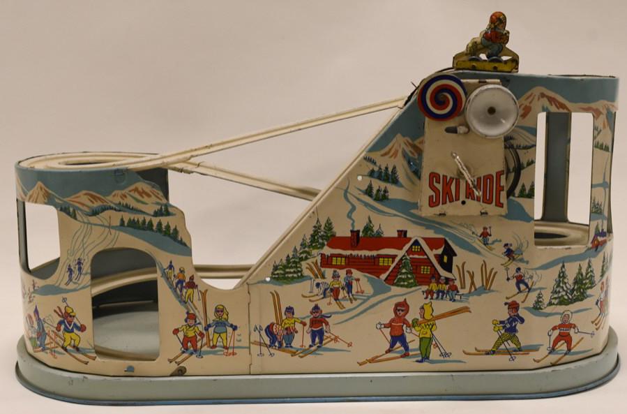 J. Chein Tin Litho Windup Ski Ride Roller Coaster: Nice tin litho windup J. Chein Ski Ride Roller Coaster. Displays nicely with wear from play and age. Measures approximately 19" long.