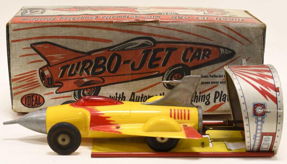 Ideal Turbo-Jet Car with Automatic Launching: Platform. Nice Ideal Turbo-Jet car with automatic launching platform with reproduction box. Toy has wear from play and age. Could be cleaned. Measures approximately 13" long.