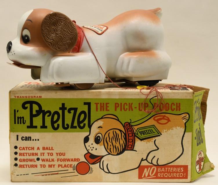 Transogram Pretzel The Pick-Up Pooch: Nice Transogram Pretzel the pick-up pooch in the box. Toy is in nice condition with some light wear from age and play. Comes with 2 balls. Measures approximately 16" long.