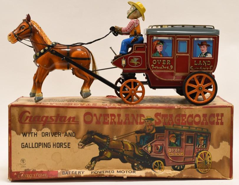 Cragstan Tin Battery Op. Overland Stagecoach: Nice tin battery operated Cragstan overland stagecoach with driver and galloping horse. Box has staining and wear from age and storage. Toy displays nicely with some wear from age. Battery compartment
