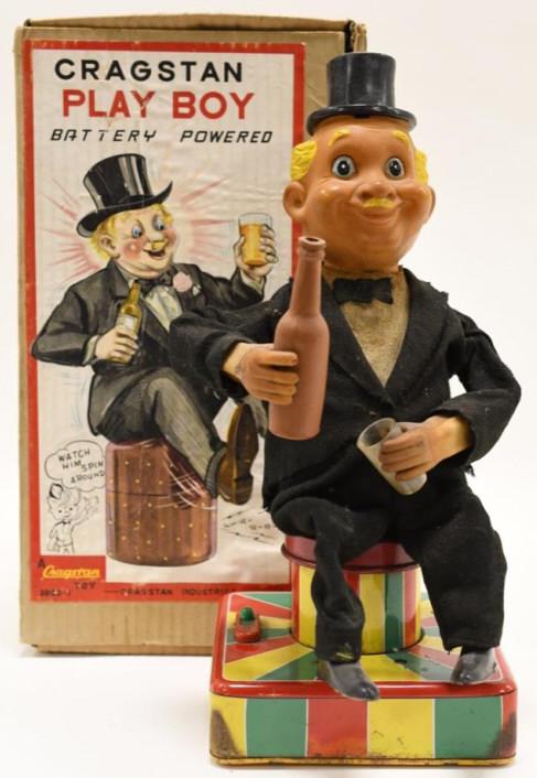 Cragstan Battery Operated Play Boy: Nice vintage Cragstan battery operated Play Boy with box. Toy is dusty and dirty. Hand was repaired with glue. Toy is untested. Measures approximately 12" tall.