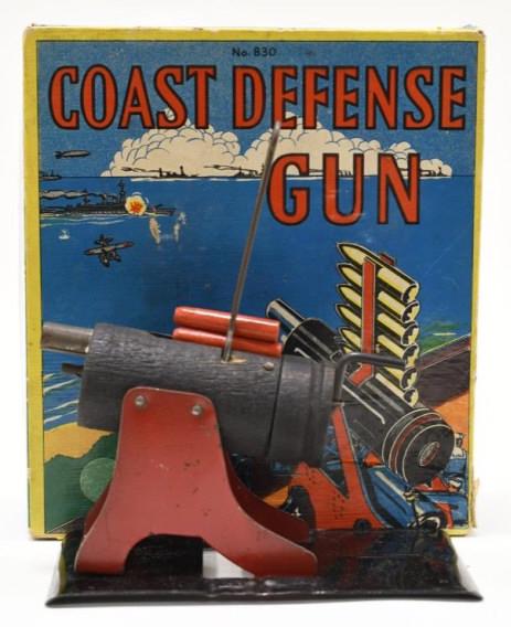 Baldwin Manufacturing Coast Defense Gun: Nice vintage Baldwin manufacturing coast gun. Displays nicely with wear from play and age. Box has some wear and tear. Comes with 3 shells. Coast defense gun is in working condition. Box measures appr