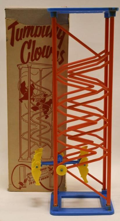 Plastic Toy and Novelty Corp. Tumbling Clowns: Nice vintage Plastic Toy and Novelty Corp. tumbling clowns with box. Box has wear from age and display. The tumbling clowns are in nice working condition. Measures approximately 16 1/2" tall.