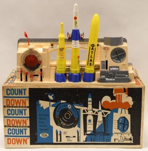 Ideal Toy Electronic Rocket Launching Station: Nice Ideal Toys electronic launching station with the box. The rockets has some cracks and chips from play and age. Toy is untested. The station measures approximately 20" across.