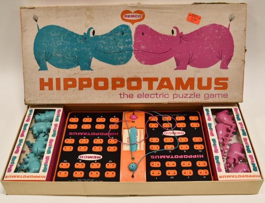 Remco Hippopotamus Electric Puzzle Game: Nice Remco Hippopotamus electric puzzle game with the box. Displays nicely with some wear from play and age. The game is untested. The box measures approximately 24" across.