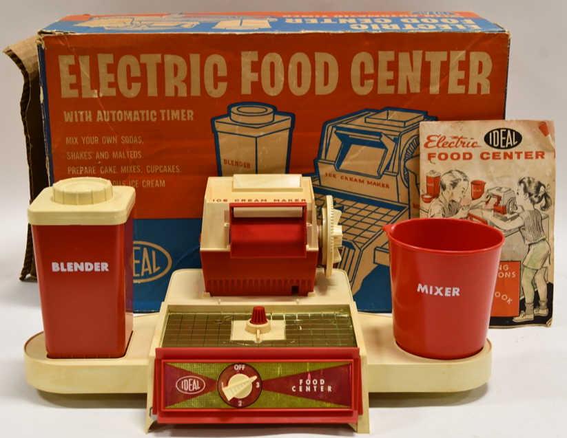 Ideal Electric Food Center: Nice Ideal Toys Electric Food Center with the box. Box displays nicely with some wear and tear from age. The food center has some discoloration and wear from play and age. Displays nicely. Toy is unte