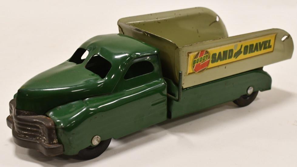 Buddy L Sand and Gravel Dump Truck: Nice Buddy L Sand and Gravel dump truck. Displays nicely with some decal wear and paint loss from play and age. Measures approximately 13" long.