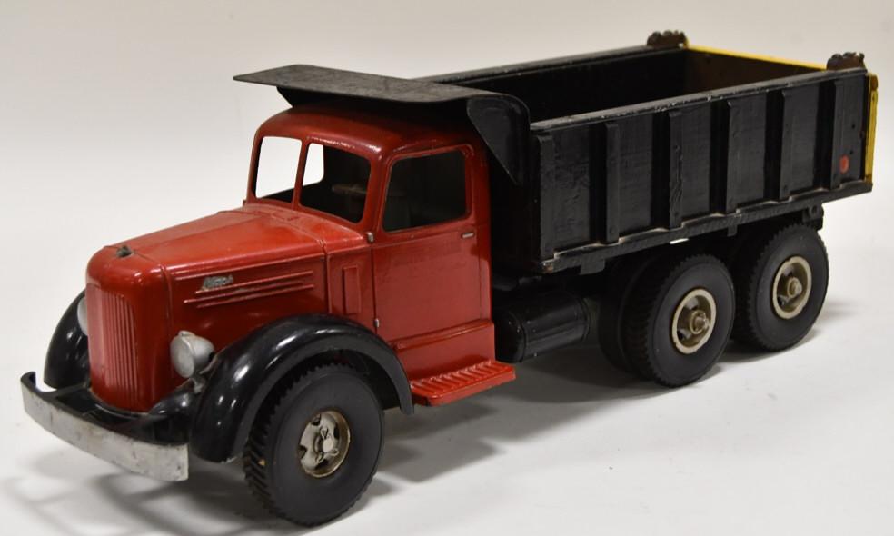 Custom Smith Miller L Mack Dump Truck: Custom Smith Miller L Mack dump truck. It is missing the Mack hood ornament and the hydraulic cylinder. Measures approximately 19" long.