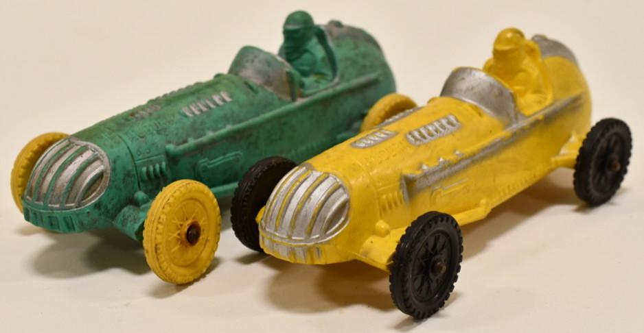 (2) Auburn Rubber Indy Style Racers: (2) Aubrun Rubber Indy Style racer cars. Both display nicely with paint loss and wear from play and age. Measures approximately 6" long.