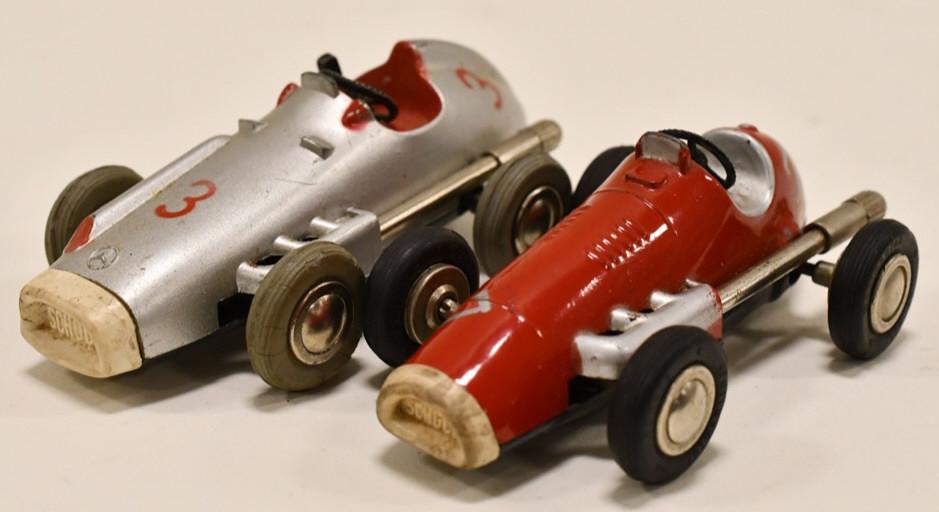 Schuco Micro Racers Mercedes #1043 & Ferrari #1040: Lot of 2 windup Schuco Micro Racers. Includes a Schuco #1043 Mercedes micro racer and a Schuco #1040 Ferrri micro racer. Both have paint loss and wear from play and age. They are both missing the keys