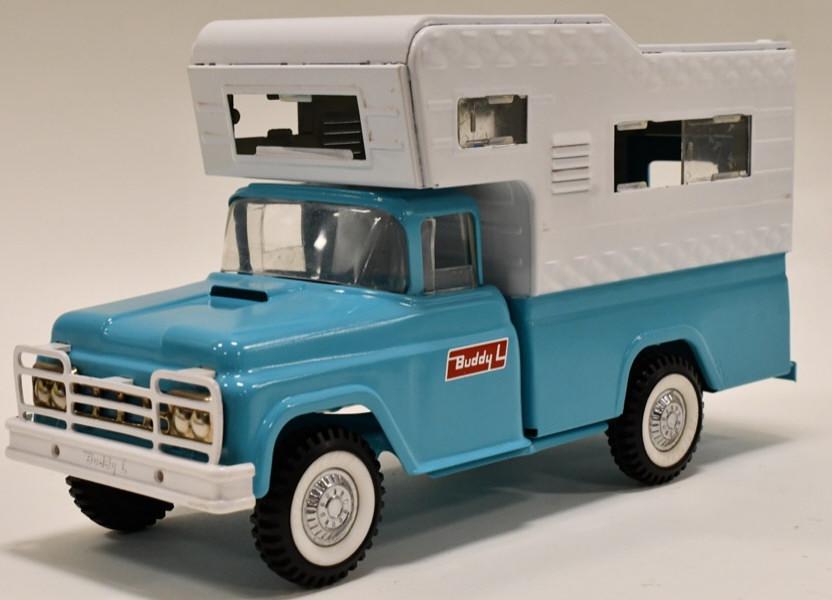 Buddy L Camper Pickup Truck: Restored Buddy L Camper pickup truck with front suspension. Displays nicely with wear from storage and display. Missing the camper window. Measures approximately 14 1/2" long.