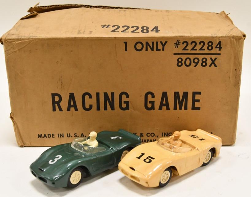 Marx International Sports Car Racing Slot Car Game: Marx International sports car racing slot car game. The set is in nice condition with the box and instructions. The set is untested. Displays nicely with wear from play and age. The cars measures appr