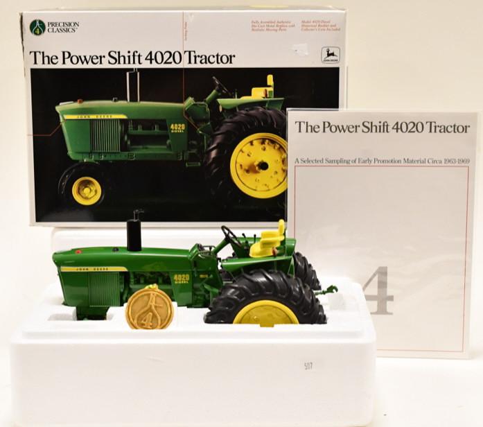 1/16 Ertl Precision #4 John Deere 4020 Powershift: Nice 1/16 scale Ertl precision #4 John Deere 4020 powershift. Toy does not have the plastic on the tires. Still looks new in the box. Box has wear from storage and display.