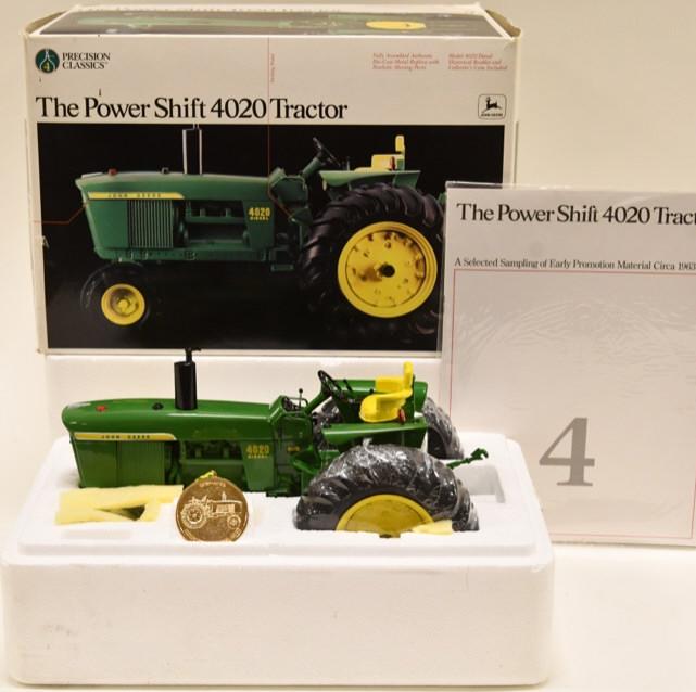 1/16 Ertl Precision #4 John Deere 4020 Powershift: Nice 1/16 scale Ertl precision #4 John Deere 4020 powershift. The box has some damage. Tractor displays nicely.