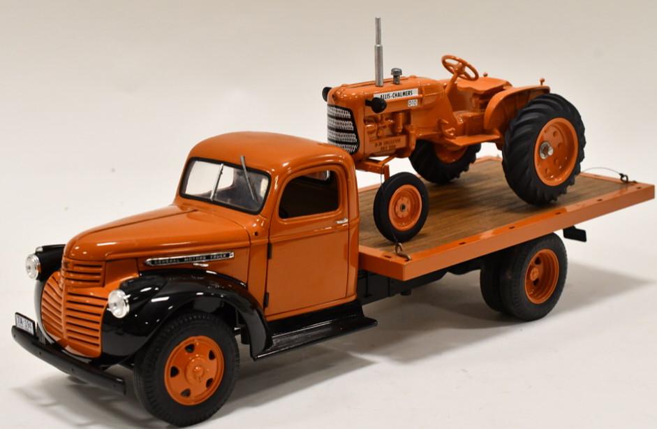 Highway 61 General Motors Flatbed w Allis Chalmers: Highway 61 General Motors flatbed truck with Allis-Chalmers D10 wide front tractor. Displays nicely with some light wear from display and storage. Nice condition.