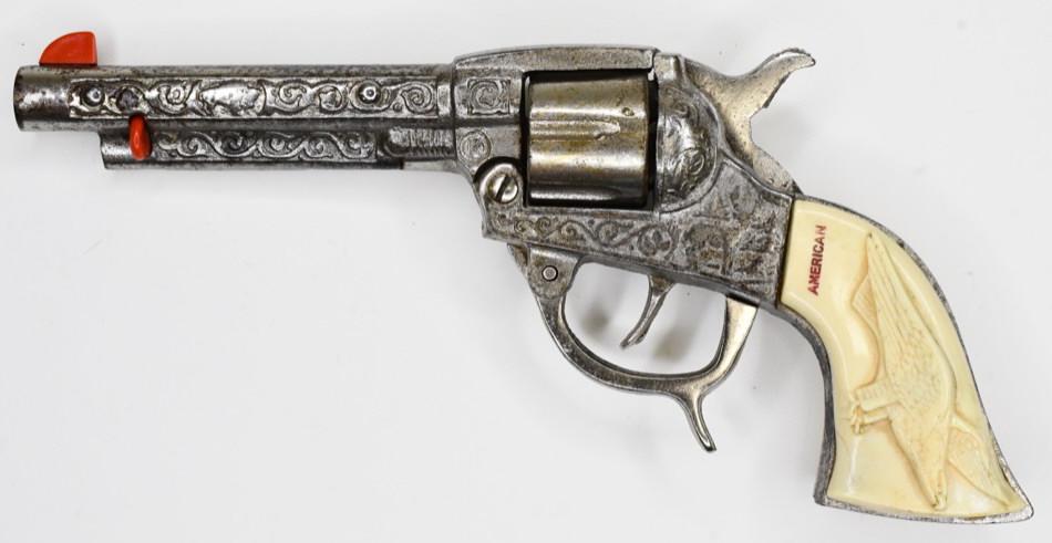 1940's Kilgore American Cap Gun Pistol: 1940's Kilgore American cap gun pistol. Displys nicely with some wear from play and age. The trigger works. Measures approximately 9 1/2" long.