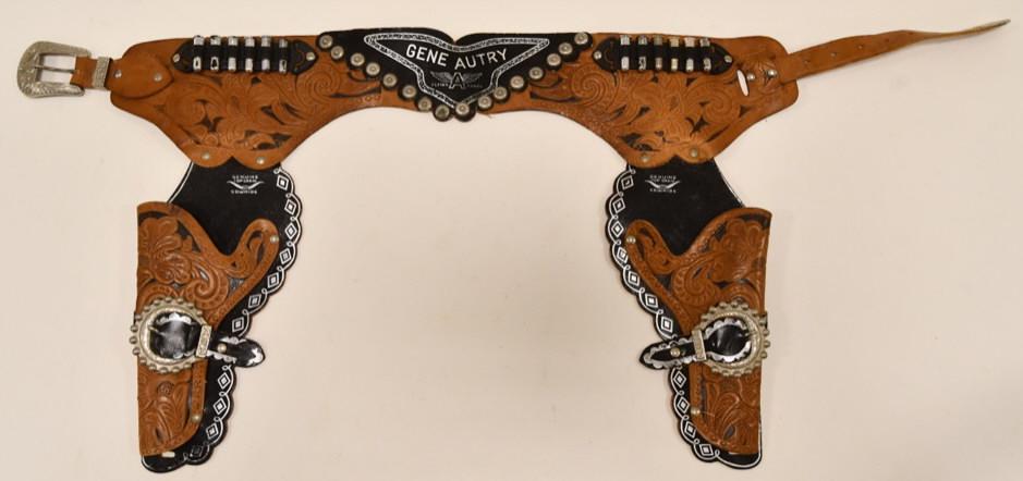Gene Autry Flying A Ranch Leather Cap Gun Holster: Beautiful Gene Autry Flying A Ranch leather cap gun holster. Displays very well with the original bullets. Nice condition with some wear from age and use.