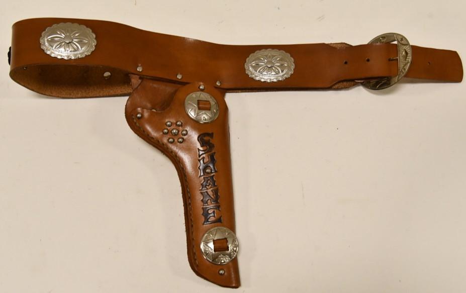 Alan Ladd Shane Cap Gun Leather Holster: Vintage Alan Ladd "Shane" cap gun leather single holster. The holster is in nice condition with some light wear from play and age. DIsplays nicely.