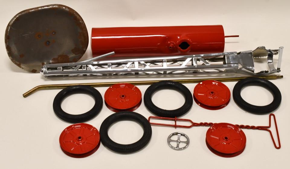 Buddy L Water Tower Sit N Ride Fire Truck Parts: Restored Buddy L water tower sit n ride fire truck parts. Includes tires, tank, steering wheel, custom seat, and more.