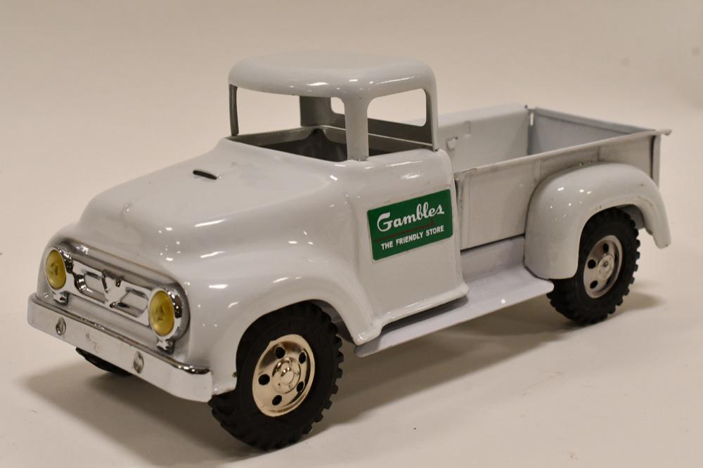 Restored Tonka Private Label Gambles Pick-Up Truck: Nice restored Tonka Gambles private label pick-up truck. Displays nicely with wear from storage and display. Has some wear to the passenger side decal. Measures approximately 12 1/2" long.
