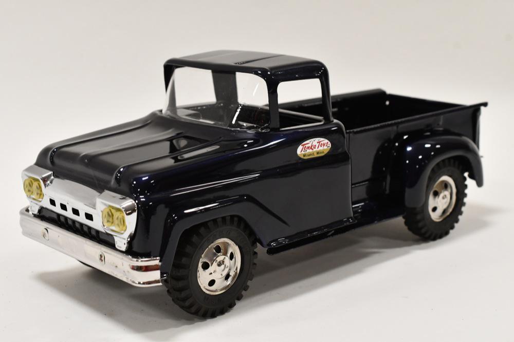 Restored Tonka Pickup Truck: Professionally restored Tonka pickup truck. Nice condition with good restoration. Displays nicely with wear from storage and display. Measures approximately 13" long.