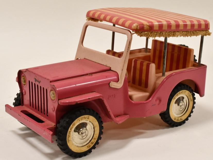Pink Tonka Jeep Surrey: Original pink Tonka Jeep Surrey No. 350. Nice condition with wear from play and age. Measures approximately 10 1/4" long.