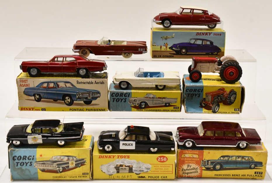 Lot of (8) Corgi and Dinky Toys: Lot of (8) Corgi and Dinky Toys. Includes Chevrolet State Patrol, Massey Ferguson Tractor, and more. Largest measures approximately 5" long.
